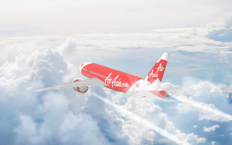 aerial_view_of_air_asia_cruising_above_fluffy_white_clouds.jpg