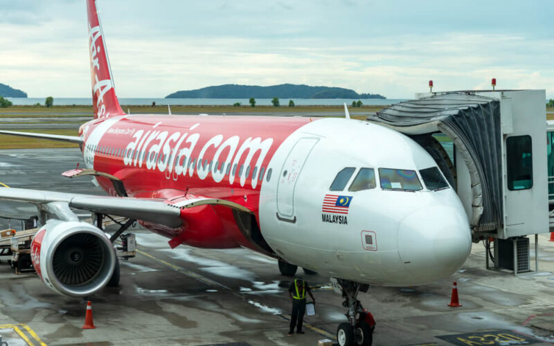 airasia_airbus_a320_family_aircraft_parked_in_kota_kinabalu_international_airport.jpg