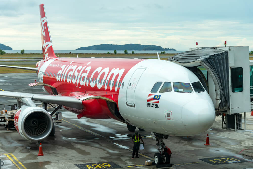 airasia_airbus_a320_family_aircraft_parked_in_kota_kinabalu_international_airport.jpg