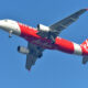 airasia_plane_landing_in_new_delhi.jpg