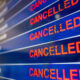 airport_departure_board_showing_cancellations.jpg