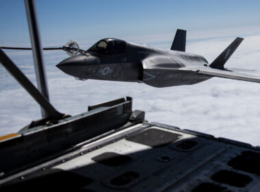 an_f-35b_lightning_ii_attack_jet_flies_alongside_a_kc-130j_tanker_aircraft.jpg