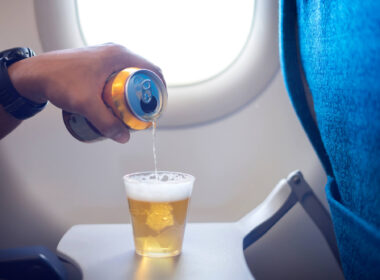 beer_being_poured_into_a_cup_onboard_a_plane.jpg