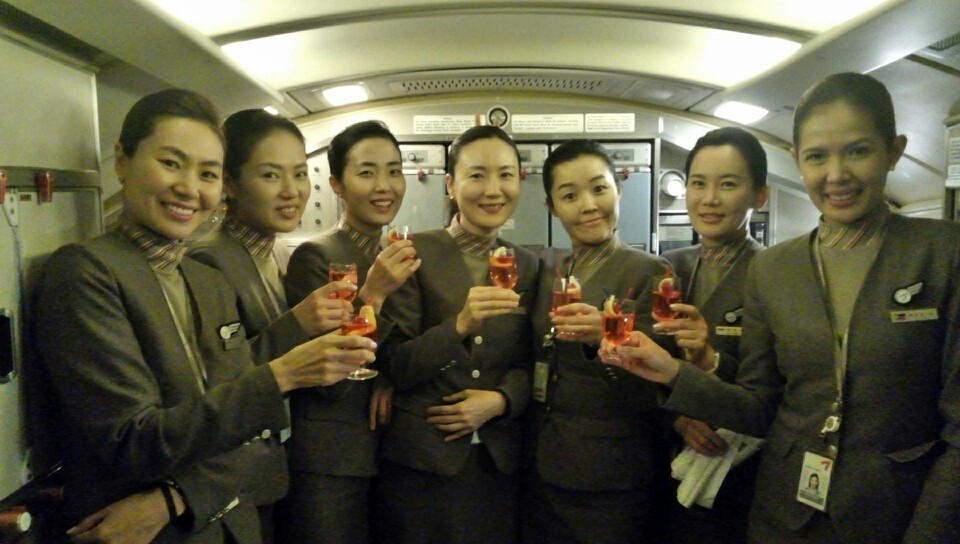 Beige de Lange and other Asiana crew