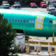 boeing_737_max_airliner_on_a_train_car_outside_the_renton_factory.jpg