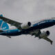 boeing_737_max_flying_over_fanrborough_air_show_in_the_united_kingdom.jpg