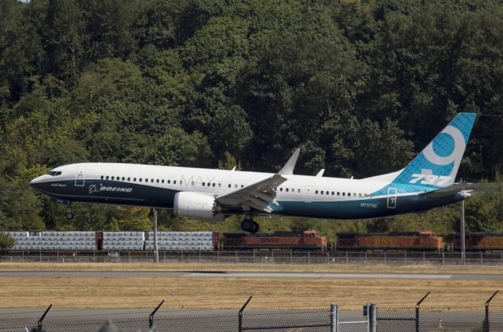 boeing_737_max_landing_at_boeing_field_airport_bfi.jpg