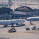 cathay_pacific_and_air_china_aircraft_at_hong_kong_international_airport.jpg