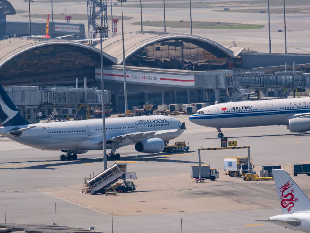 cathay_pacific_and_air_china_aircraft_at_hong_kong_international_airport.jpg