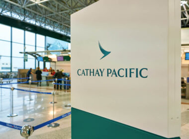 cathay_pacific_sign_at_milan_malpensa_airport.jpg