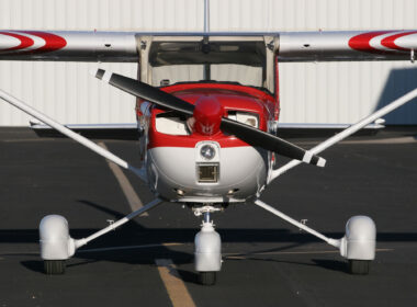 The Cessna 150 Aerobat A150M flying formation desert mountains