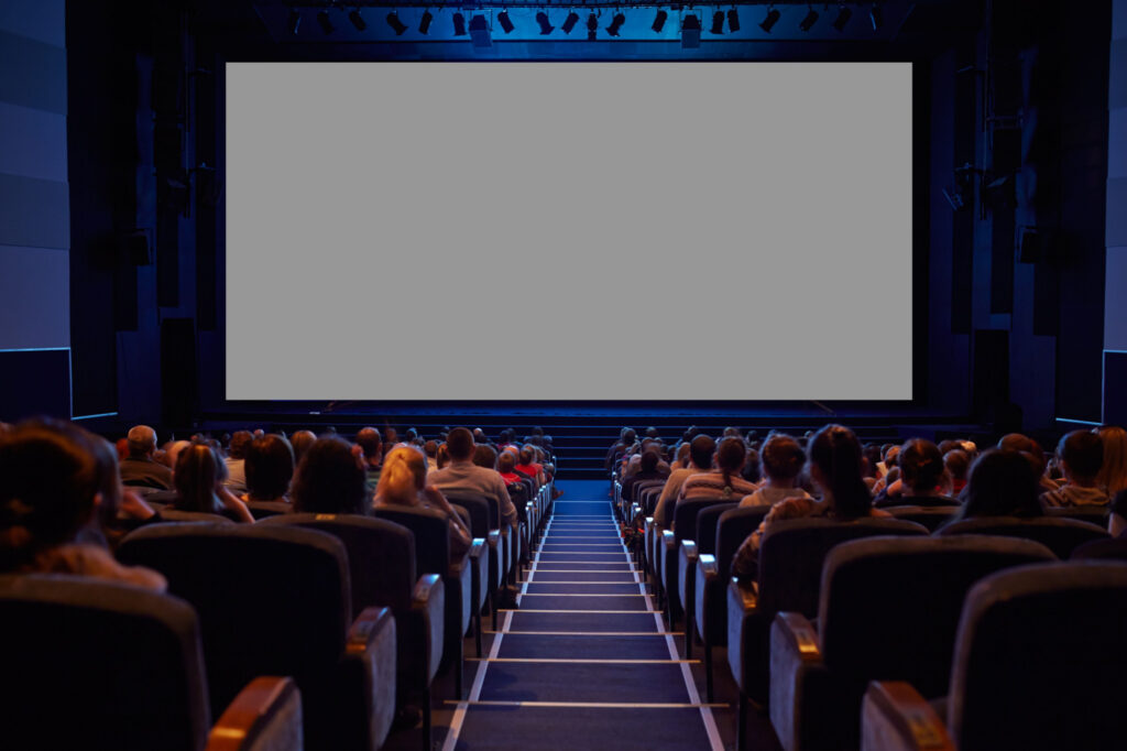 Empty cinema screen with audience