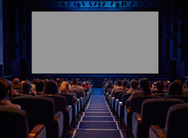 Empty cinema screen with audience