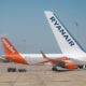 easyjet-airbus-a320-family-aircraft-and-ryanair-boeing-737-ng-at-tenerife-airport-in-spain.jpg