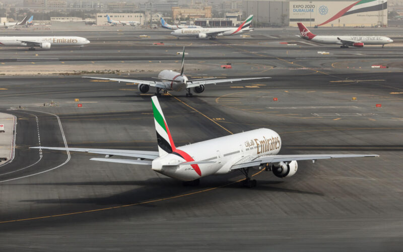 emirates_boeing_777_taxiing_at_a_busy_dubai_international_airport_dxb.jpg