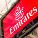 emirates_logo_on_a_tv_screen_at_an_airport.jpg