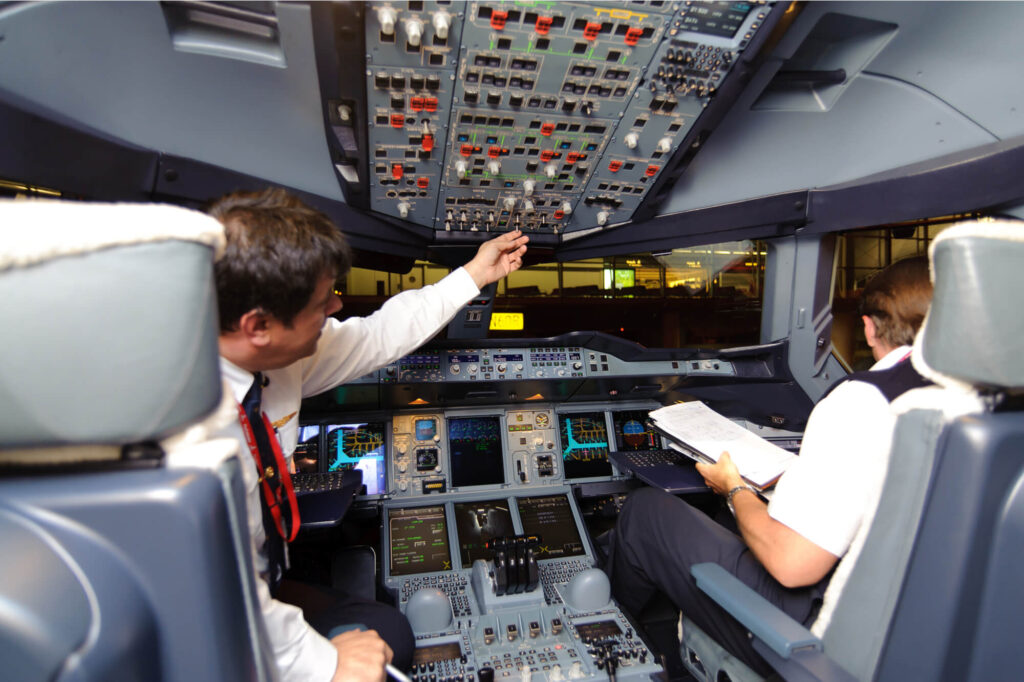 emirates_pilots_in_the_cockpit_of_an_a380.jpg