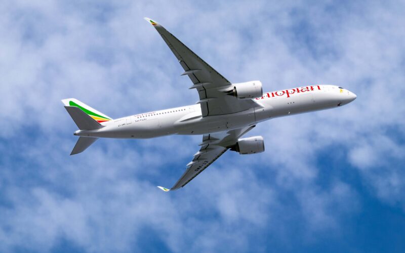 ethiopian_airlines_airbus_a350_flying_overhead_through_a_blue_but_cloudy_sky..jpg