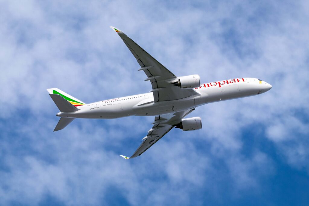 ethiopian_airlines_airbus_a350_flying_overhead_through_a_blue_but_cloudy_sky.-min.jpg