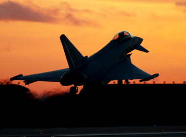 eurofighter_typhoon_seen_landing_at_sunset_in_the_uk.jpg