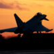 eurofighter_typhoon_seen_landing_at_sunset_in_the_uk.jpg