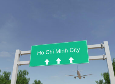 ho_chi_minh_city_sign_with_aircraft_in_the_background.jpg