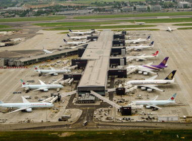 Aerial view of planes at Terminal 2 of London Heathrow Airport on a cloudy day. Airlines using this terminal include Air Canada, Singapore Airlines and United Airlines.