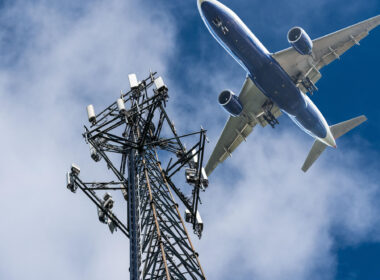 mobile_phone_tower_with_aircraft_coming_in_to_land.jpg