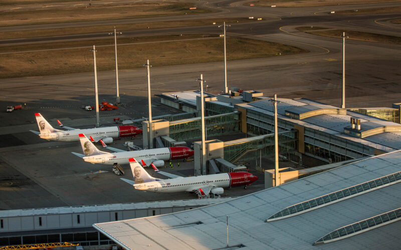 norwegian_aircraft_waiting_at_gates.jpg