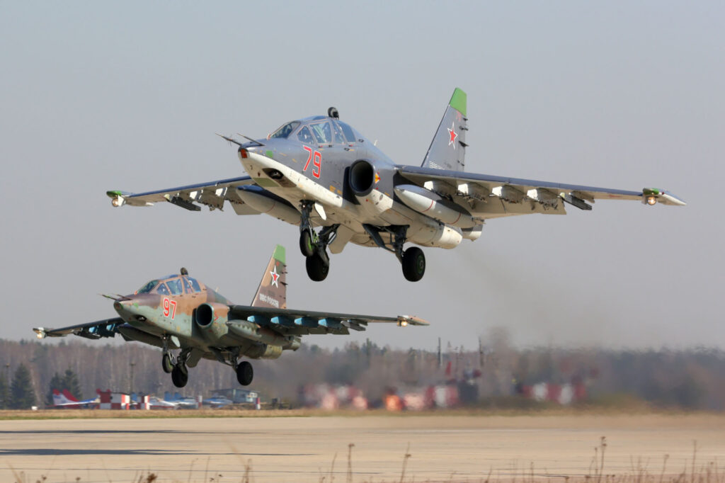 pair_of_russian_sukhoi_su-25_attack_aircraft_taking_off.jpg