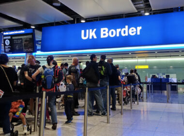 passengers_queue_at_heathrow_airport.jpg