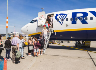 passengers_queue_to_board_a_ryanair_plane.jpg