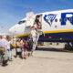 passengers_queue_to_board_a_ryanair_plane.jpg