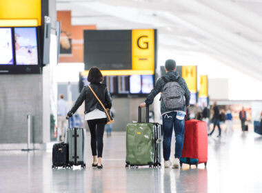 passengers_with_luggage_at_heathrow_airport.jpg