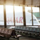 qatar_airways_airbus_a380_parked_at_doha_international_airport_gate.jpg