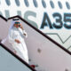 qatar_airways_chief_executive_akbar_al_baker_deboarding_an_airbus_a350.jpg