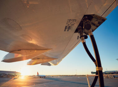 refuelling_of_a_plane_during_sunset.jpg