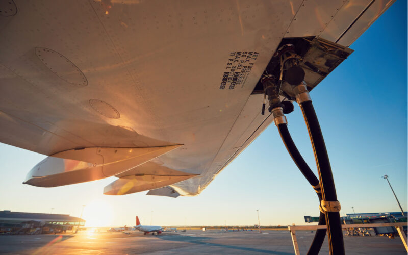 refuelling_of_a_plane_during_sunset.jpg