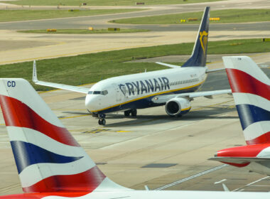 ryanair_boeing_737_taxis_past_british_airways_planes_at_london_gatwick.jpg