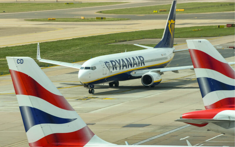 ryanair_boeing_737_taxis_past_british_airways_planes_at_london_gatwick.jpg