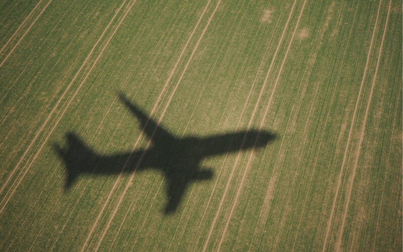 shadow_of_a_plane_in_a_field_during_landing.jpg