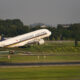 singapore_airlines_a380_taking_off_from_changi.jpg