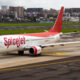 spicejet_b737_taxiing_at_mumbai_airport.jpg