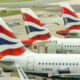 tail_fins_of_three_british_airways_jets_at_gatwick_airport.jpg