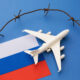 toy_aircraft_with_a_russia_flag_and_barbed_wire.jpg