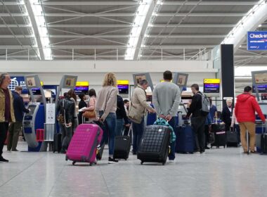 travellers_at_a_check_in_at_heathrow_airport_1.jpg