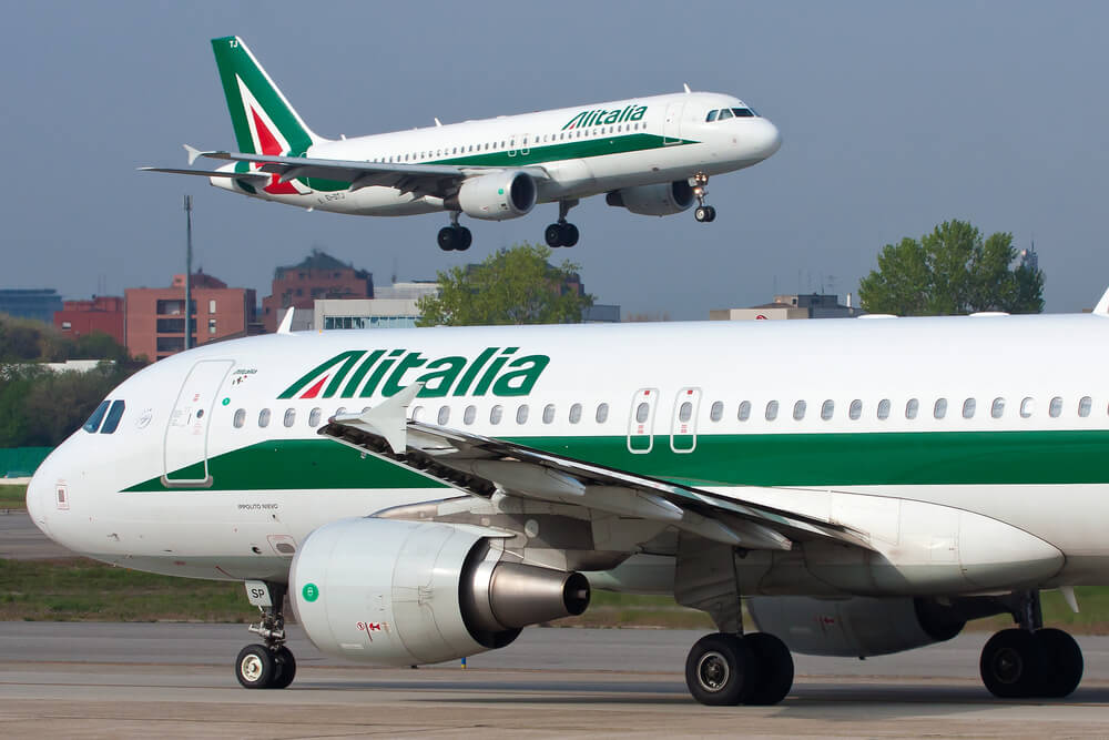 two_alitalia_airbus_a320_aircraft_in_milan_linate_airport_lin_italy-1.jpg