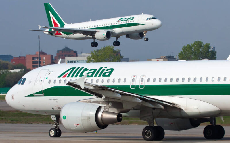 two_alitalia_airbus_a320_aircraft_in_milan_linate_airport_lin_italy.jpg