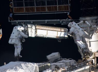 two_astronauts_installing_the_irosa_system_on_the_iss.jpg