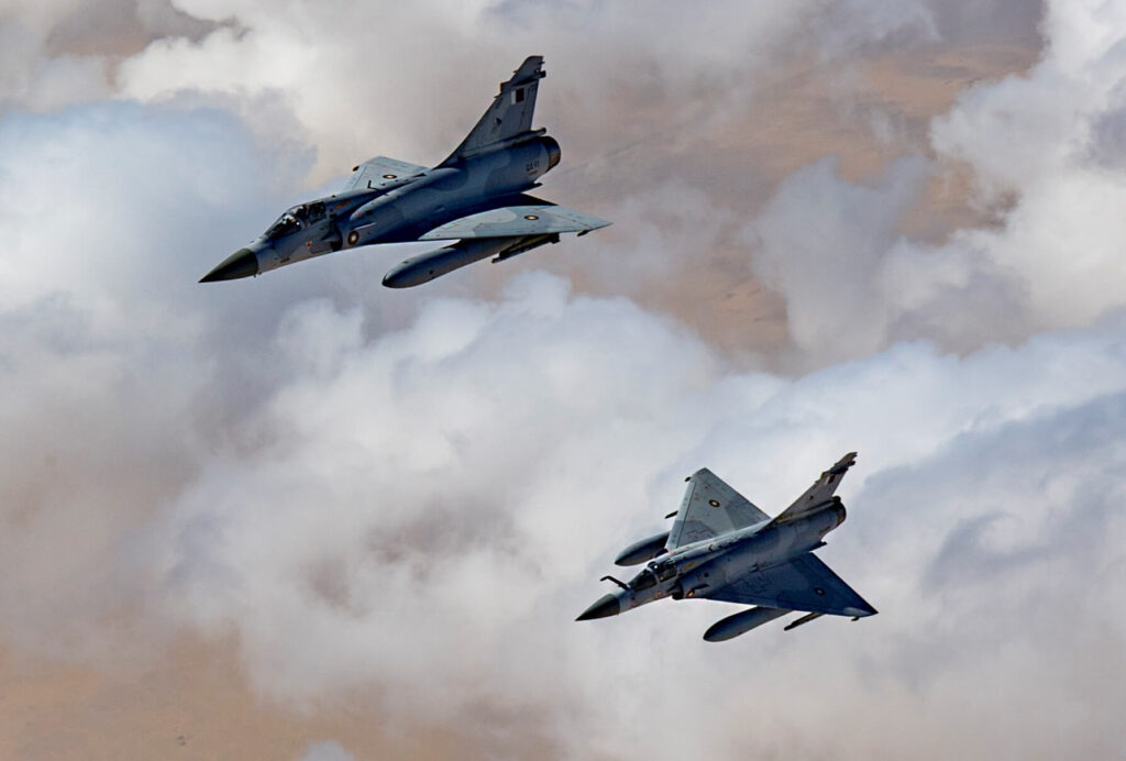 two_qatari_mirage_2000s_flying_in_formation.jpg